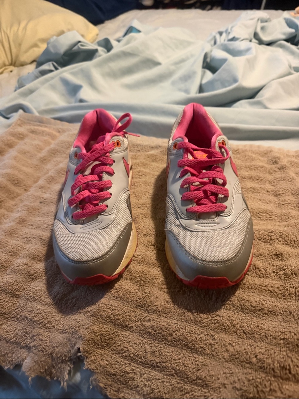 Nike Women's White and Pink Athletic Sneakers with Silver Accents